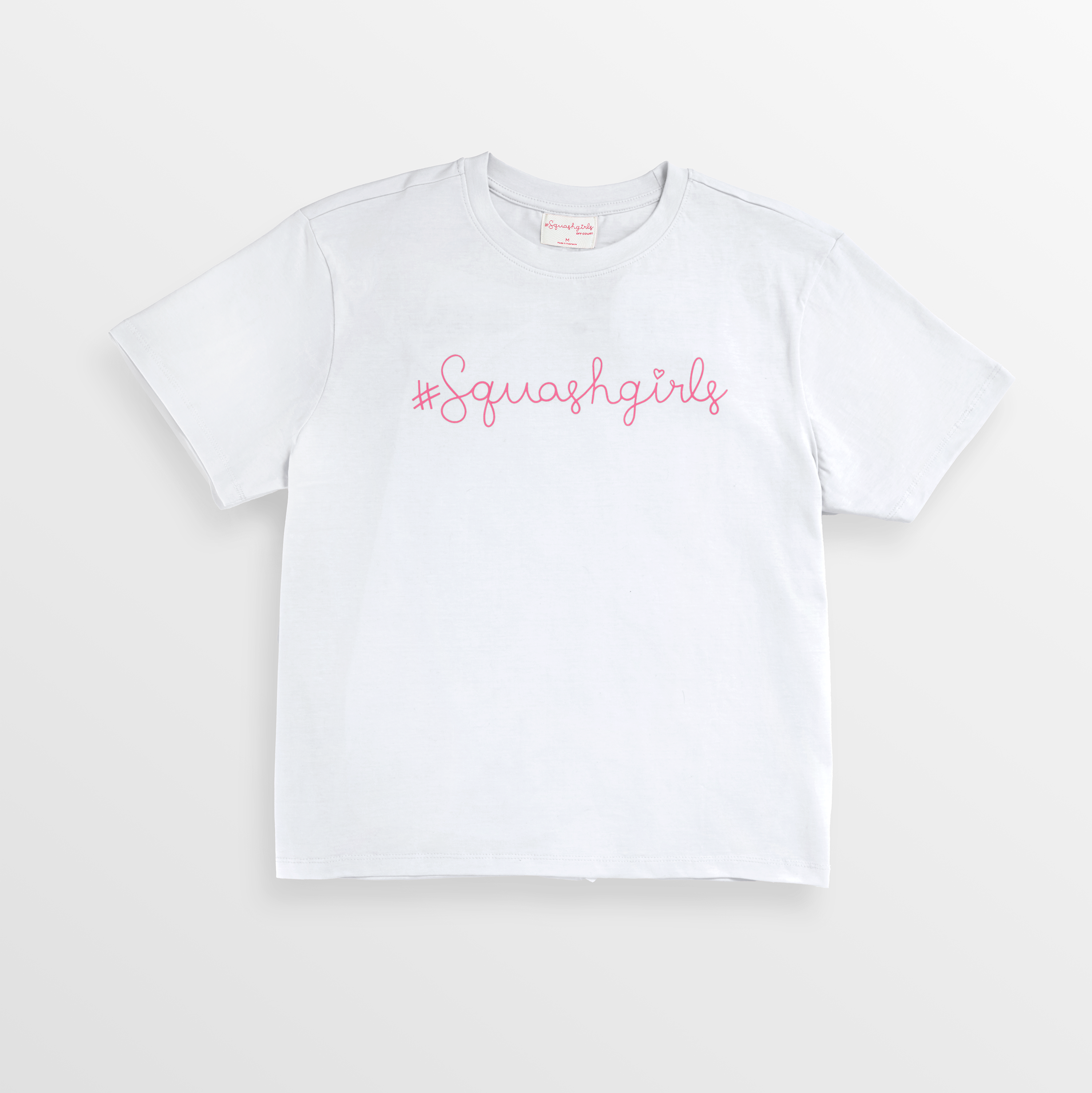 White t-shirt with '#Squashgirls' text on a light gray background