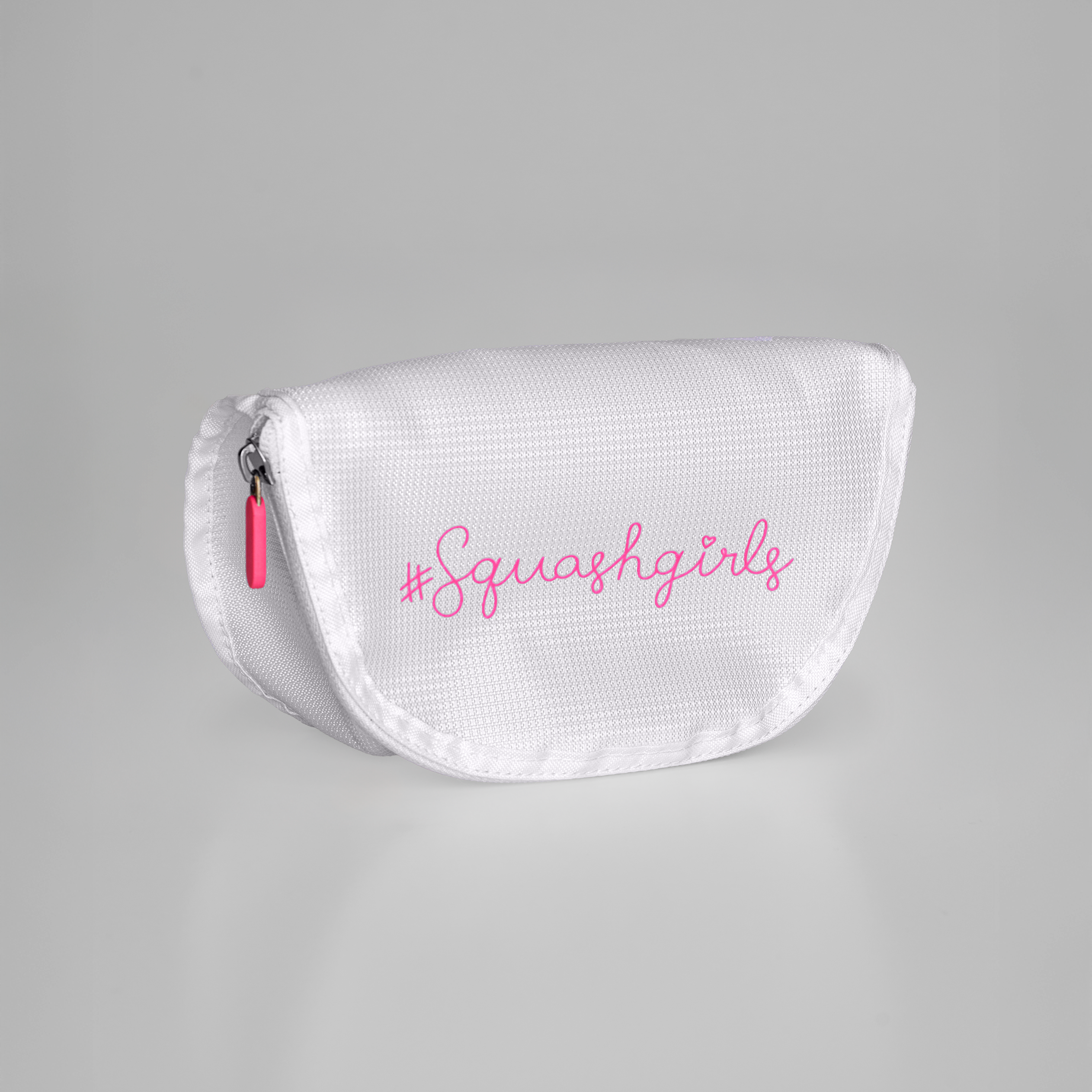 White pouch with '#Squashgirls' text on a gray background