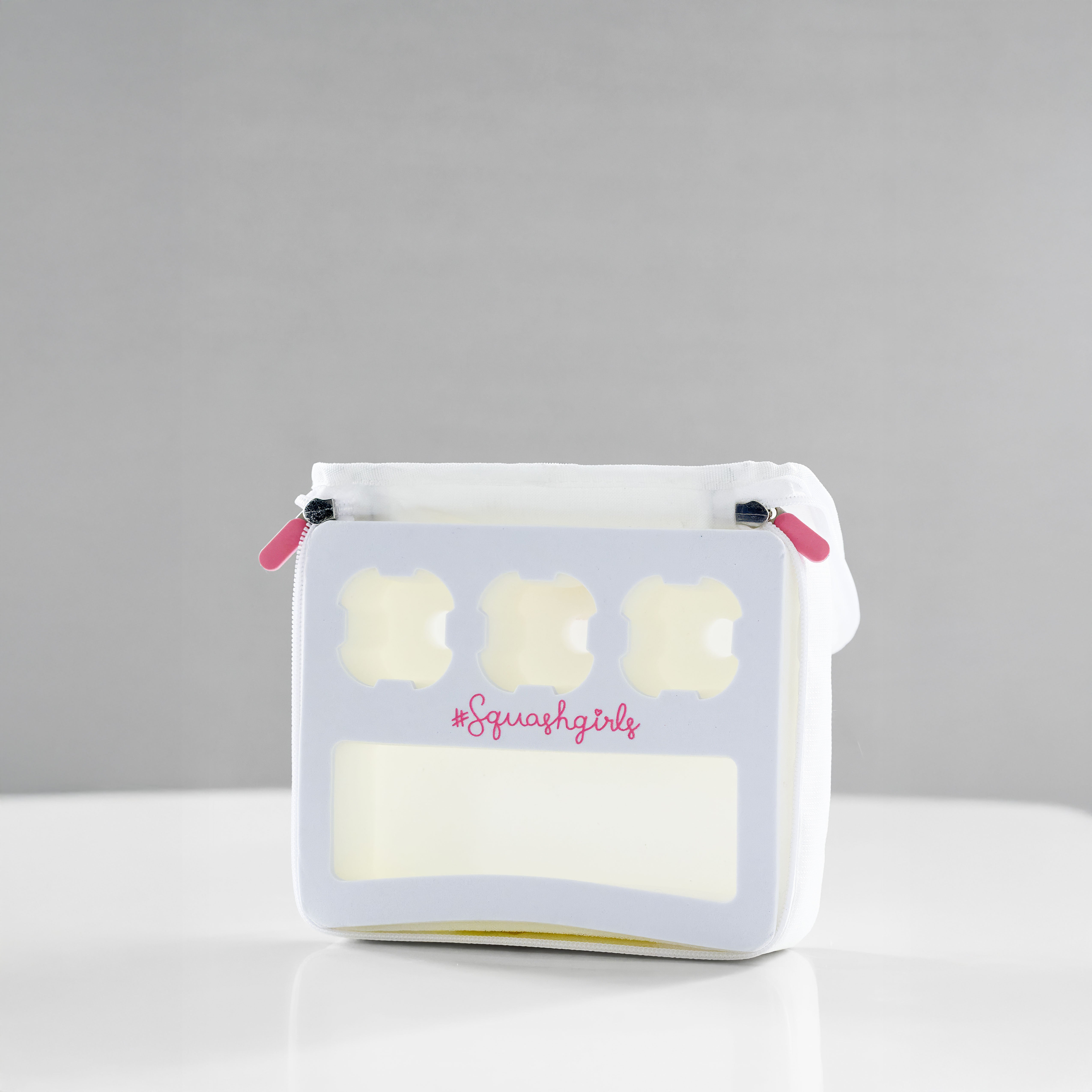 Small pouch with a design of three squares and 'Squashgily' branding on a gray background