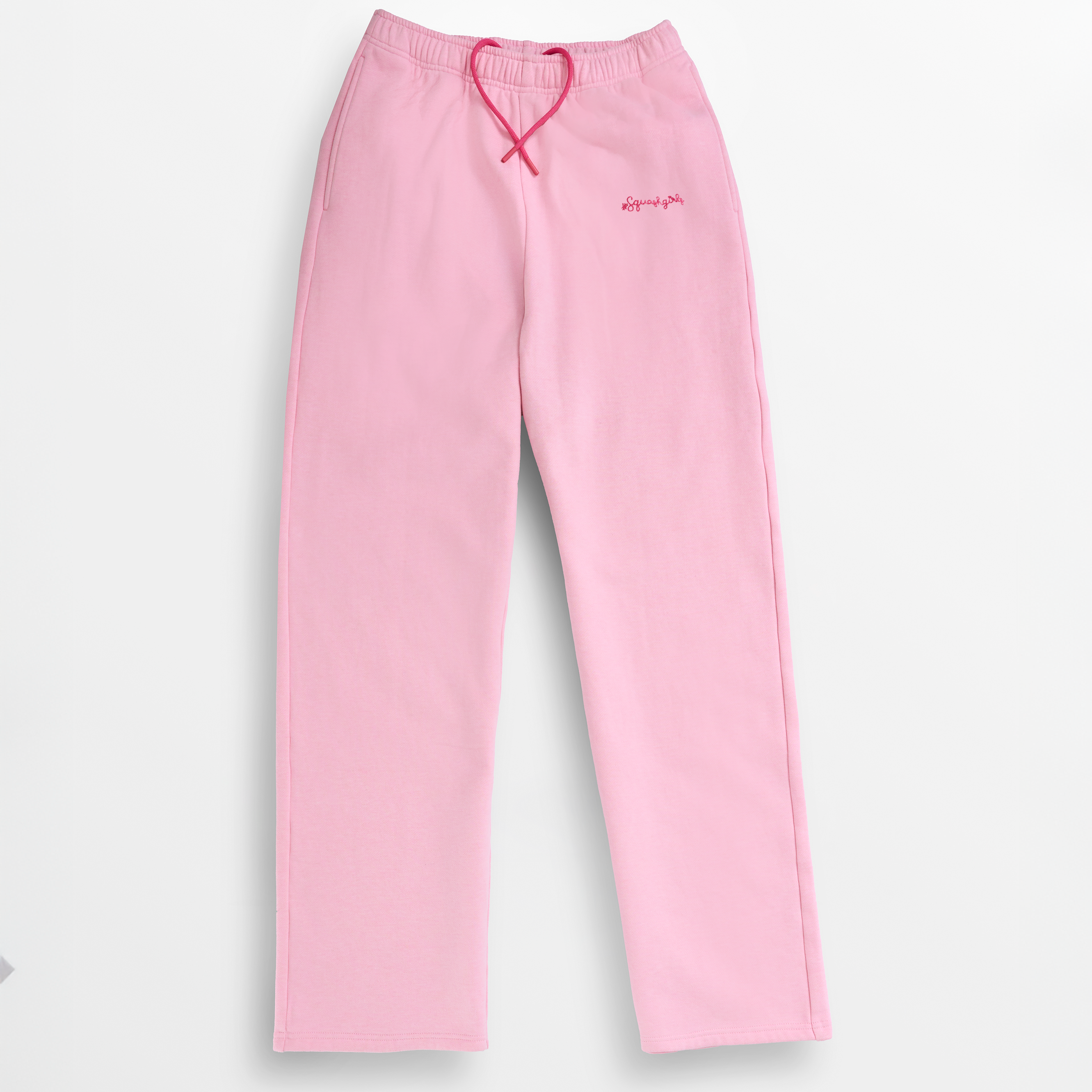 Pink sweatpants on a white background